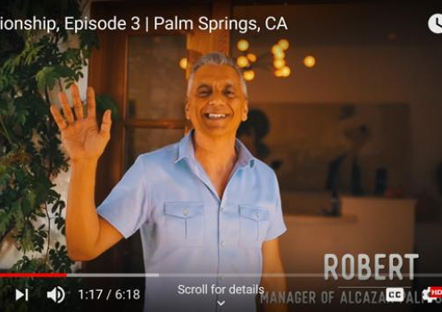 A screenshot of Alcazar Palm Springs Manager Robert Hunt waving to the camera