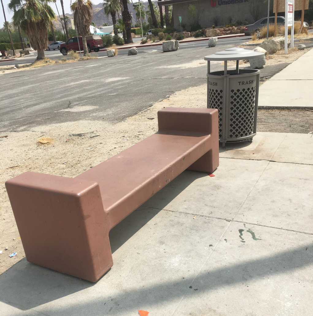 A before shot of the plain brown benches have been transformed by local artists.