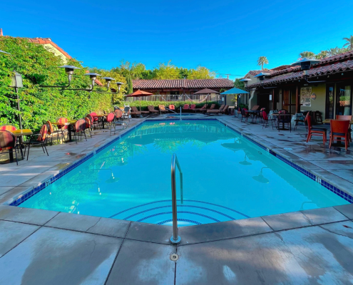 The pool at Los Arboles Hotel in Palm Springs, California, is always a cool place to be on a warm summer day