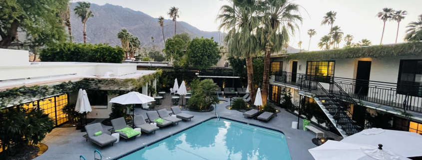 The pool at Descanso Resort in Palm Springs, California, is surrounded by comfortable lounge chairs and wide umbrellas