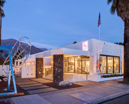 The white exterior of Eight4Nine restaurant in downtown Palm Springs, California