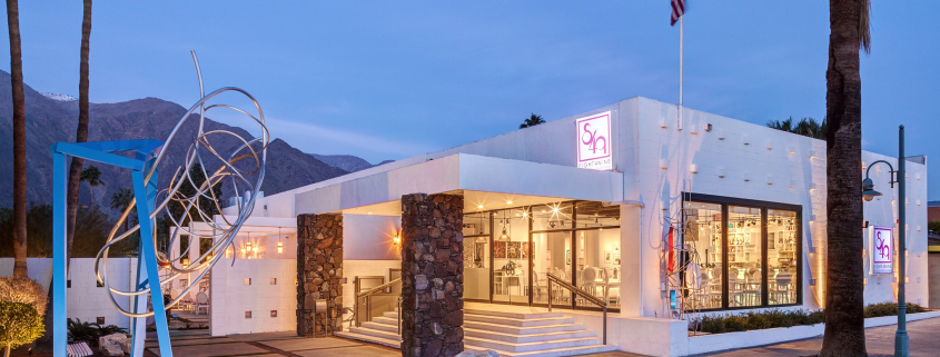 The white exterior of Eight4Nine restaurant in downtown Palm Springs, California