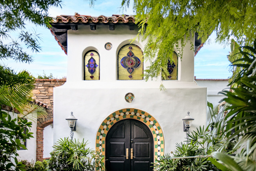 The outside of the lobby at The Lucille Palm Springs with colorful tile and windows