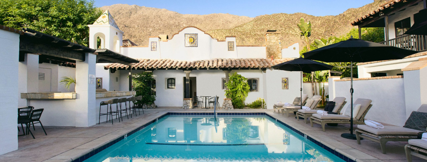 The pool at The Lucille Palm Springs with the San Jacinto Mountains in the background