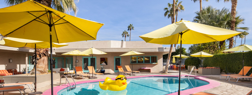 Yellow umbrellas surround the pool at El Noa Noa