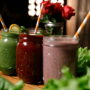 Colorful fruit smoothies in glass mason jars