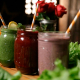 Colorful fruit smoothies in glass mason jars